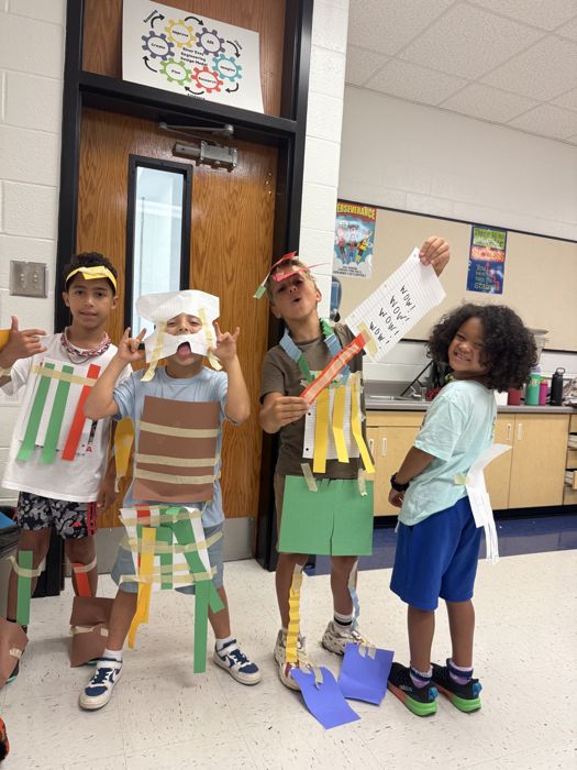 Students in paper costumes